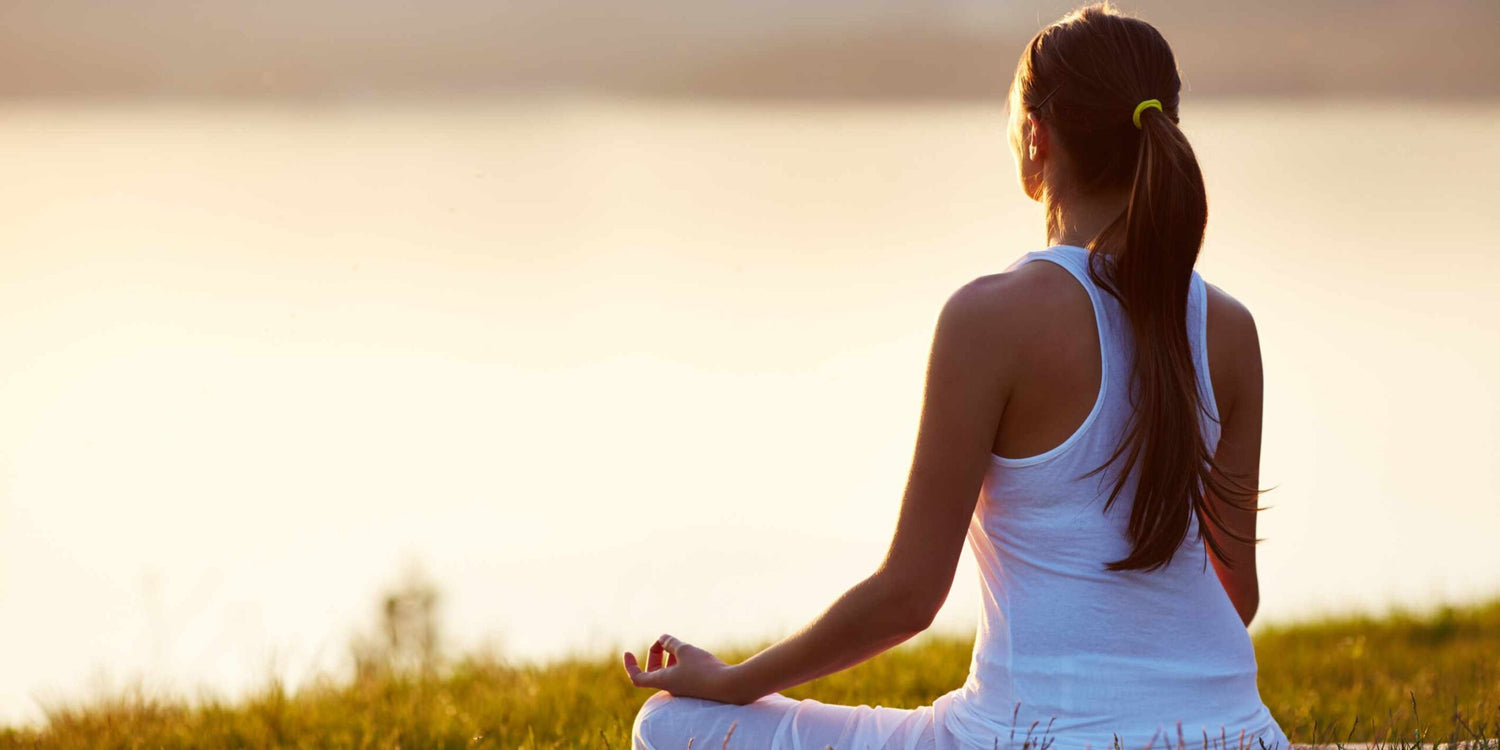 Woman meditating health foods 